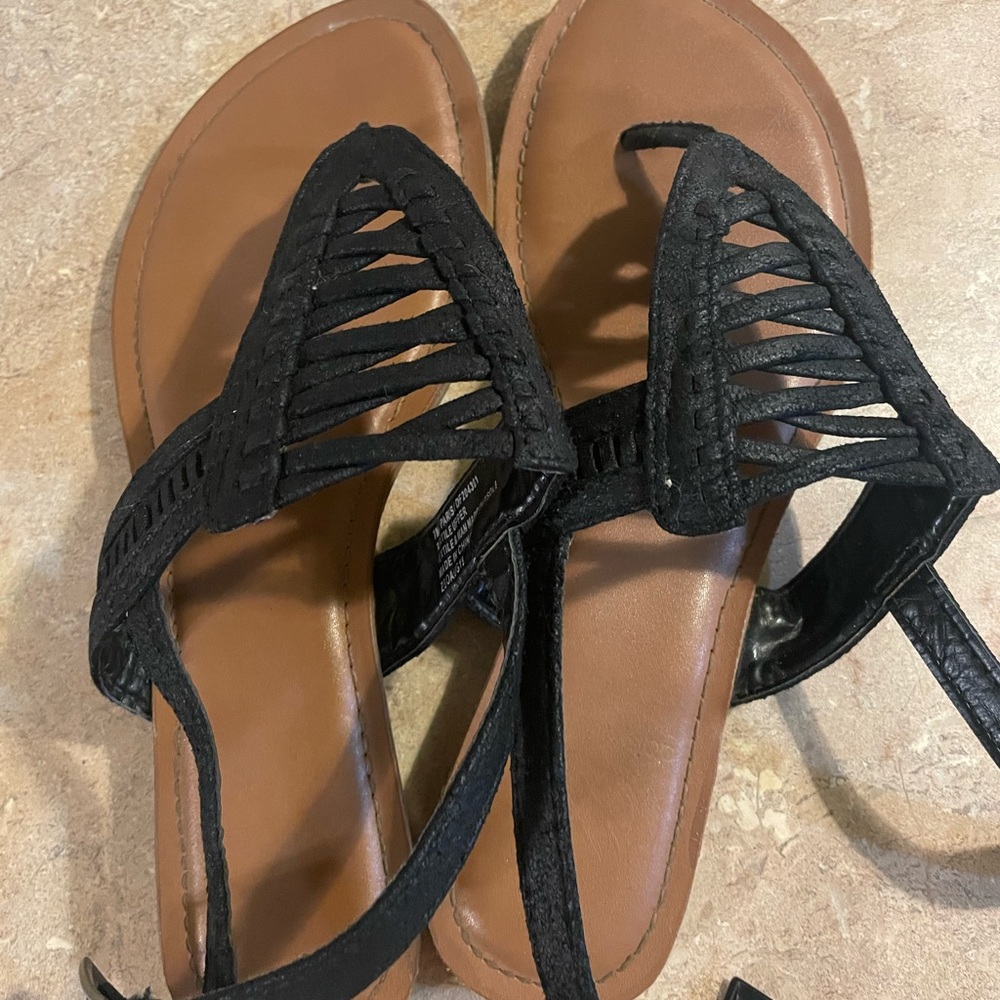 Black Sandals bottoms dirty from one wear. See pics above